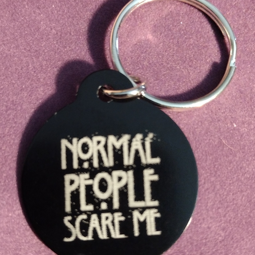 Black Keychain with White Text